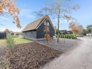 Modern bungalow in Baarle-Nassau with pond view