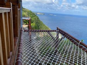 Suwehan Beach Cliff House by BIJAK