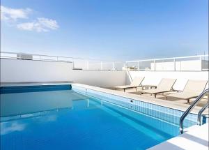 Conforto e charme - com AC, Piscina e Rooftop