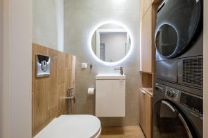 Wola Signature Apartment by BookingHost