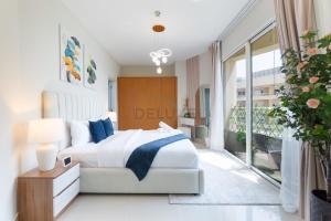 Balcony Offering Captivating Lake Views 1BR, Just a Hop from the Golf Course, Lakeside B, Dubai Production City by Deluxe Holiday Homes