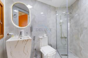 Balcony Offering Captivating Lake Views 1BR, Just a Hop from the Golf Course, Lakeside B, Dubai Production City by Deluxe Holiday Homes