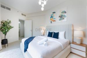 Balcony Offering Captivating Lake Views 1BR, Just a Hop from the Golf Course, Lakeside B, Dubai Production City by Deluxe Holiday Homes