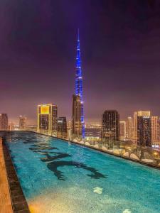 CH Burj Khalifa View Pool 1BR Paramount Escape