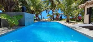 Piscine rien que pour vous, propriété entière face au lagon, les pieds dans l 'eau, cuisine & wifi Le Boraha Beach Lodge 90 m2