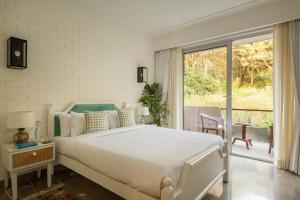 Hibiscus Oasis - Pool Facing Homestay in Candolim