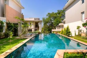 Hibiscus Oasis - Pool Facing Homestay in Candolim