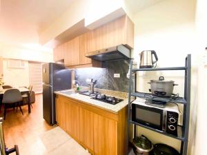 Prisma Residences - 1 Bedroom Paid Parking & Kitchen Near BGC