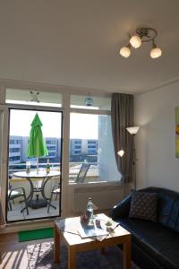 Inselblume 74 - Ferienwohnung mit Balkon am Yachthafen