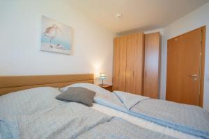 Inselblume 56 - Ferienwohnung am Südstrand mit Meerblick