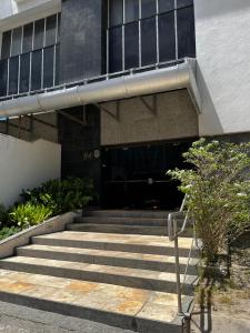 Quarto a 10m da praia ao lado de Pubs e Restaurantes