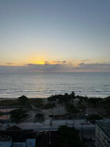 Quarto a 10m da praia ao lado de Pubs e Restaurantes