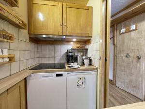 AM03 Spacieux T2 skis aux pieds Les Menuires