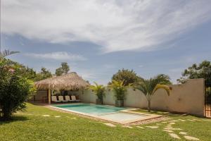 Cozy 2BR Apto Terrace, Pool & AC Steps from Beach