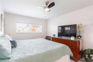 Oasis Waterfront Treasure Island Condo with Patio Dock and Johns Pass