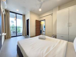 Peaceful Candolim 2BHK Apartment - Family Stay, Scenic View, Pool