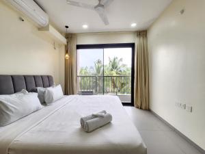 The Calm Cove by Mirashya Homes- 2BHK Serviced Family Stay near Candolim Beach