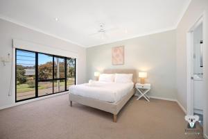 KozyGuru | Chittaway Point | Lakeside Luxe Retreat