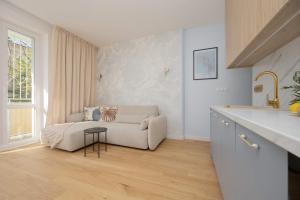 Family Apartment in Saska Kępa Bright & Functional Interiors with Balcony by Noclegi Renters