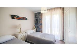 Stone House By Anemos Tinos