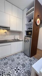 1BR Pioneer Woodland Condominium connected to BONI Metro Rail Station,Boni Mandaluyong Metro Manila