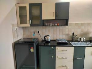 Pracheeta Homes Diya AC 2BHK Near Temple & Airport on First Floor