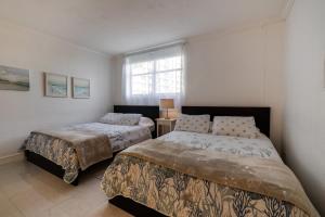 Beachfront Winter Escape, Balcony with Ocean View, Amenities