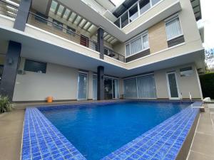 Villa palem 9 kamar 16-40 orang