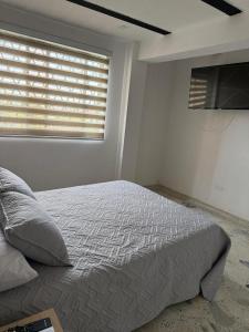 Habitación privada tipo apartaestudio