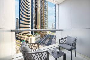 StayMada - Torch Tower Elegant Marina Retreat