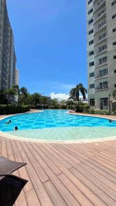 SolAzur Staycation SMDC South Residences Las Piñas with 100MBPS Wifi &NETFLIX &BAR STATION &CITY LIGHTS VIEW