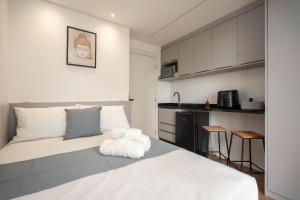 Modernidade no Batel | Suíte luxo