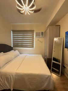 Urban Oasis Cozy Studio at Berkeley Suites South Forbes Nuvali