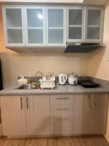 Urban Oasis Cozy Studio at Berkeley Suites South Forbes Nuvali