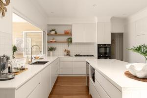 Elegant Queenslander Home with Tropical Pool Area