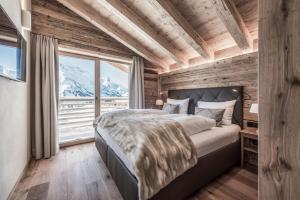 Aadla Walser-Chalets mit privater Sauna, Hotpot und Hotelservice