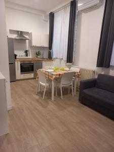 Elegant and modern two-room apartment with equipped kitchen