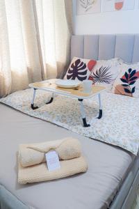 Cozy Three-Bedroom Staycation House with Netflix, Wi-Fi, and Free Parking Garage near SM Caloocan