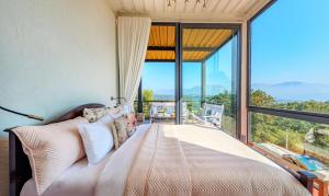 SaffronStays Satori Perch Regal - 4BR Tuscan-style villa with pool, farm meals & 270 Degree Mulshi Lake views near Pune