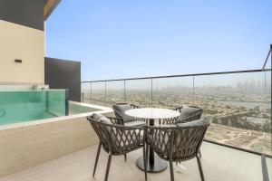VayK - Stylish 2BR in JVC with Private Pool