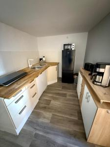 Retro und Gemütlichkeit im Fachwerkhaus - 2 Schlafzimmer, Wohnzimmer, Parkplatz, Balkon - W3