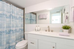 Oasis Waterfront Treasure Island Condo with Patio Dock and Johns Pass