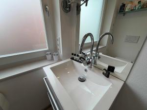 Haus Iris Dünenwind - Ferienwohnung mit Blick ins Grüne