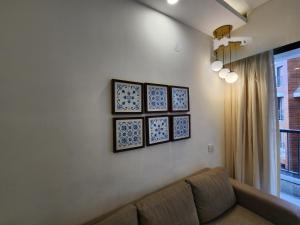 The Tranquil Haven - Candolim 1BHK with Pool & Balcony