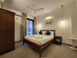 The Tranquil Haven - Candolim 1BHK with Pool & Balcony