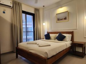 The Tranquil Haven - Candolim 1BHK with Pool & Balcony