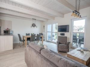 Stranddüne 4 - modernes Ferienhaus am Deich mit Sauna und Kamin