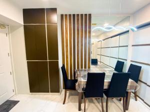 2BR Across SM San Lazaro Self Check-In & Parking Option