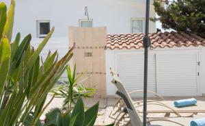 Bungalow Alexia - Garden Oasis near Coral Bay Beach