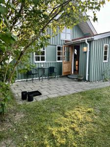 Idyllic summer house in calm, green surroundings